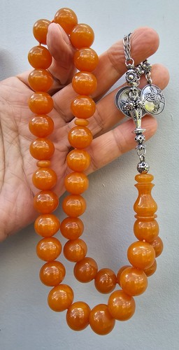 Amber bakelite prayer - amber,